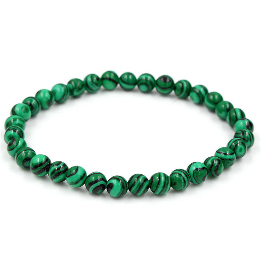 a green and black beaded bracelet