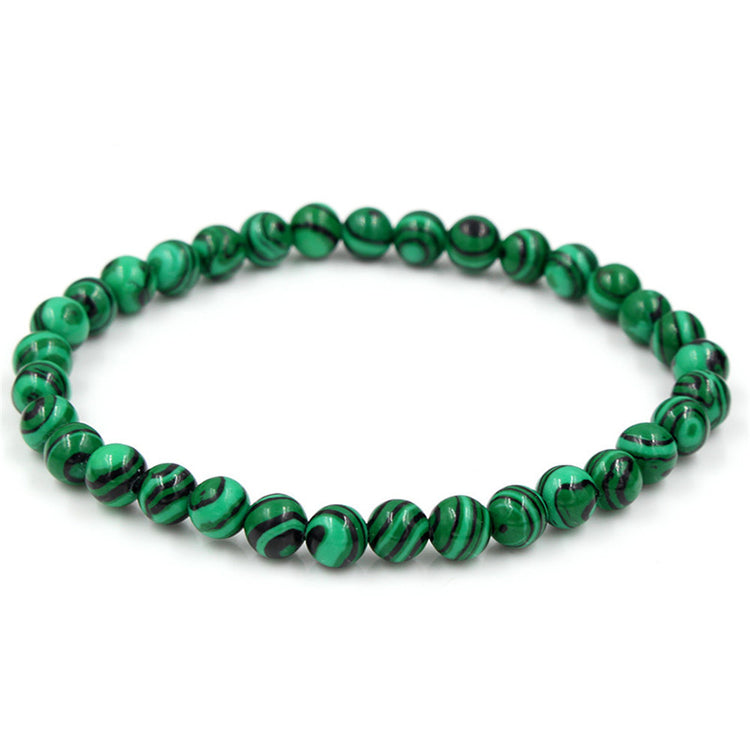 a green and black beaded bracelet