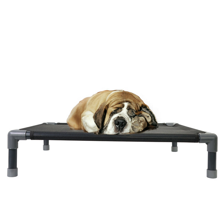 a dog lying on a small bed