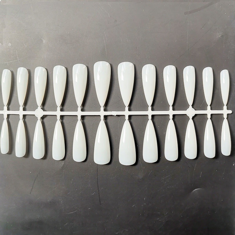 a plastic tray of white nails
