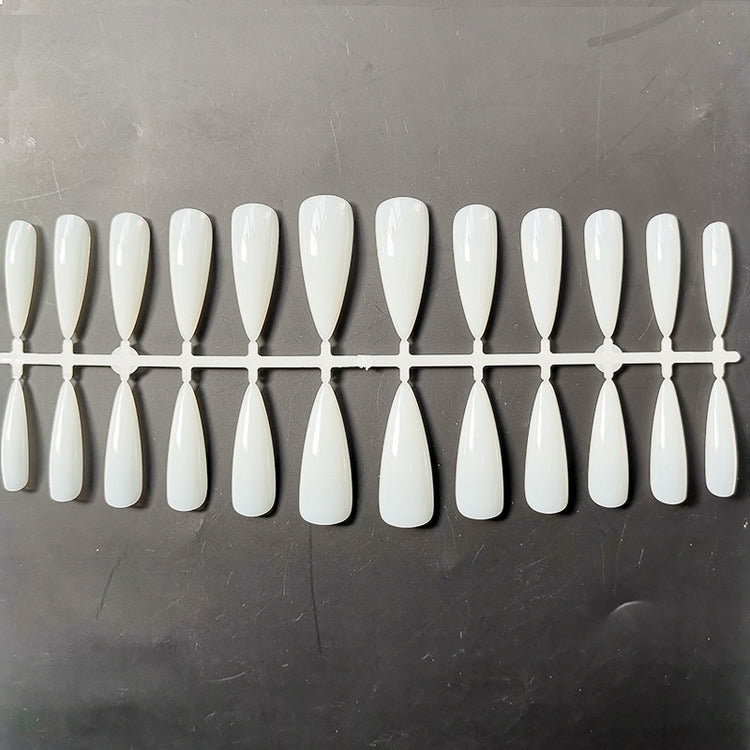 a plastic tray of white nails