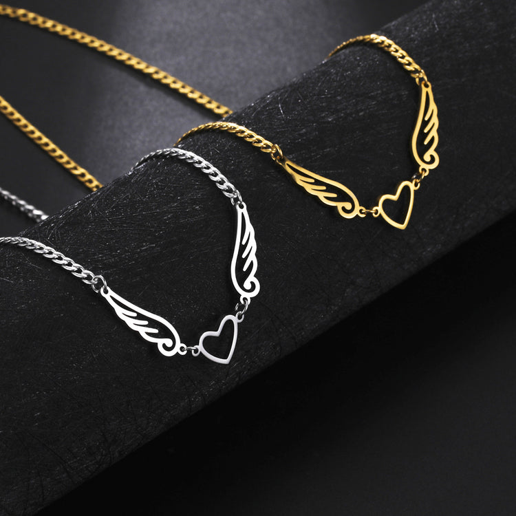 a group of necklaces on a black surface