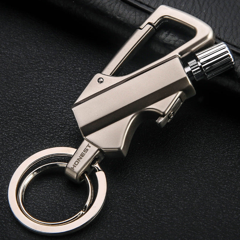 a key chain on a leather surface