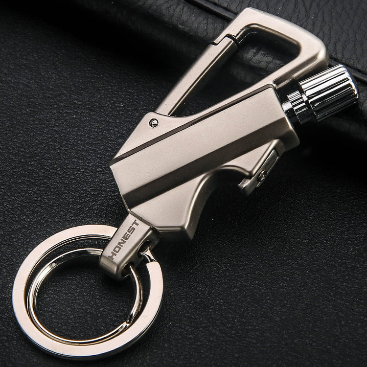 a key chain on a leather surface