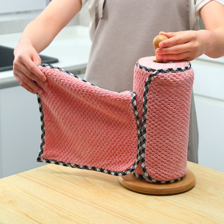 a person holding a pink towel