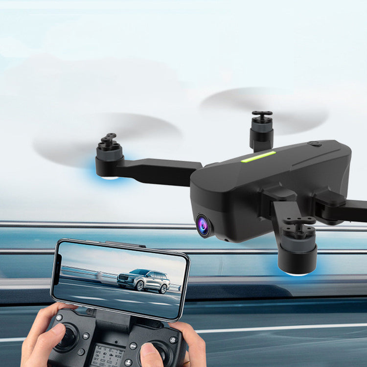 a drone flying over a road