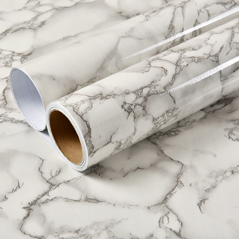a roll of white and black marbled paper