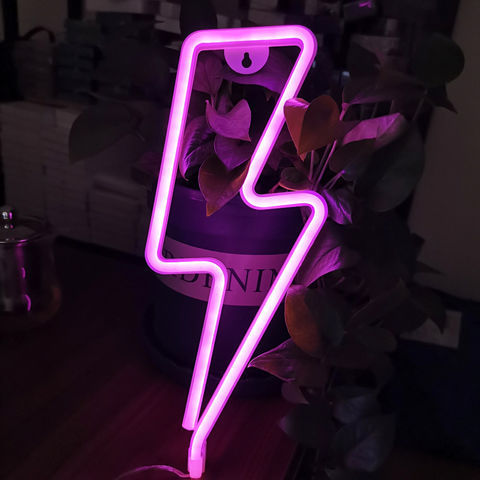 a purple light up sign