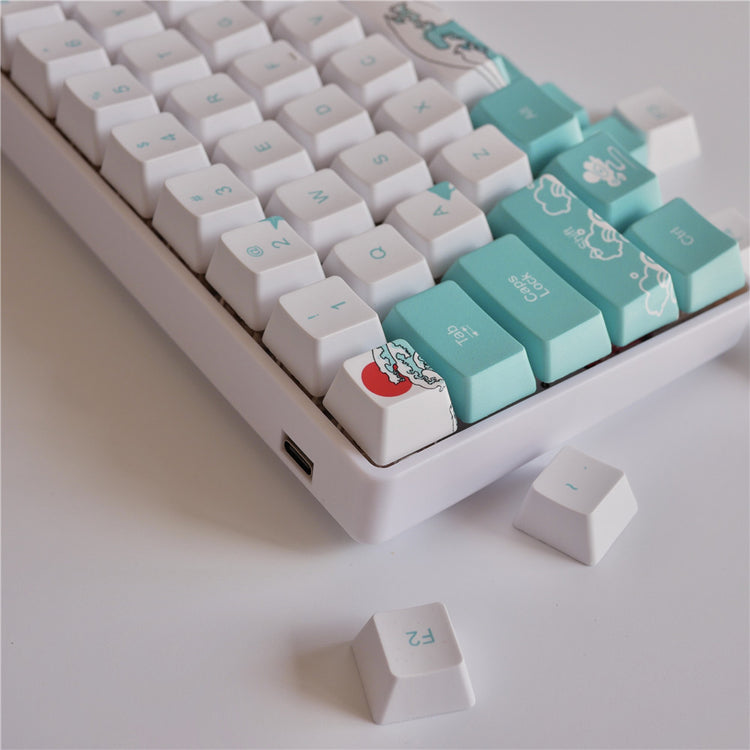 a keyboard with a blue and white keypad