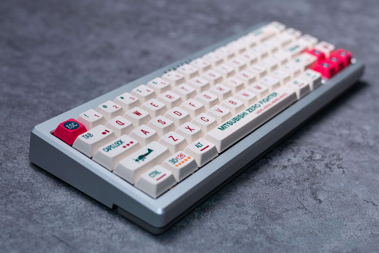 a white keyboard with red and white keys