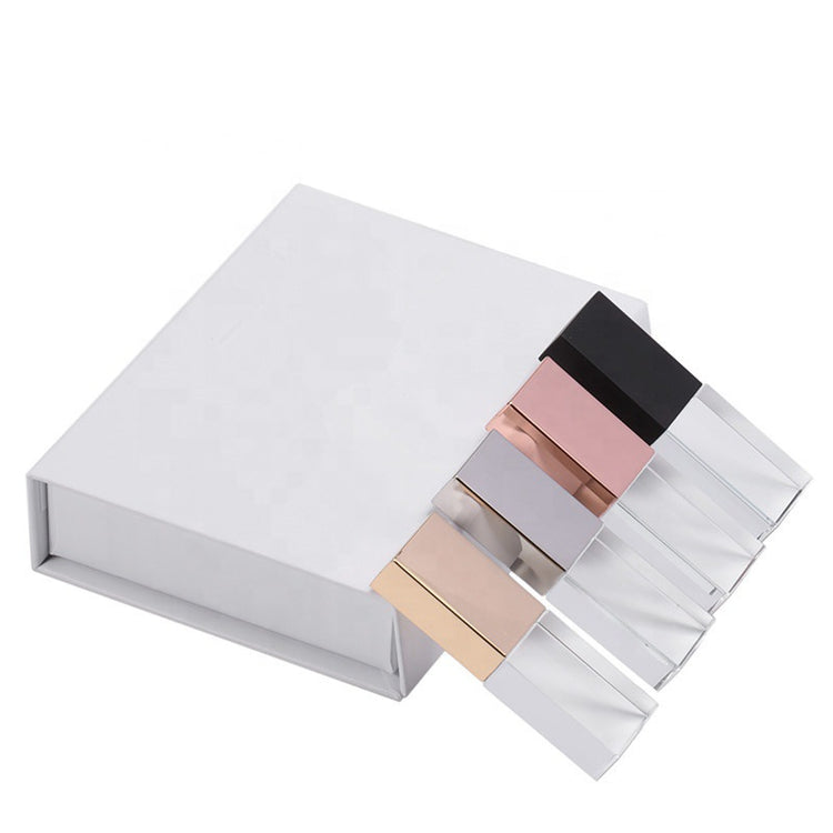 a white box with different colored objects in it