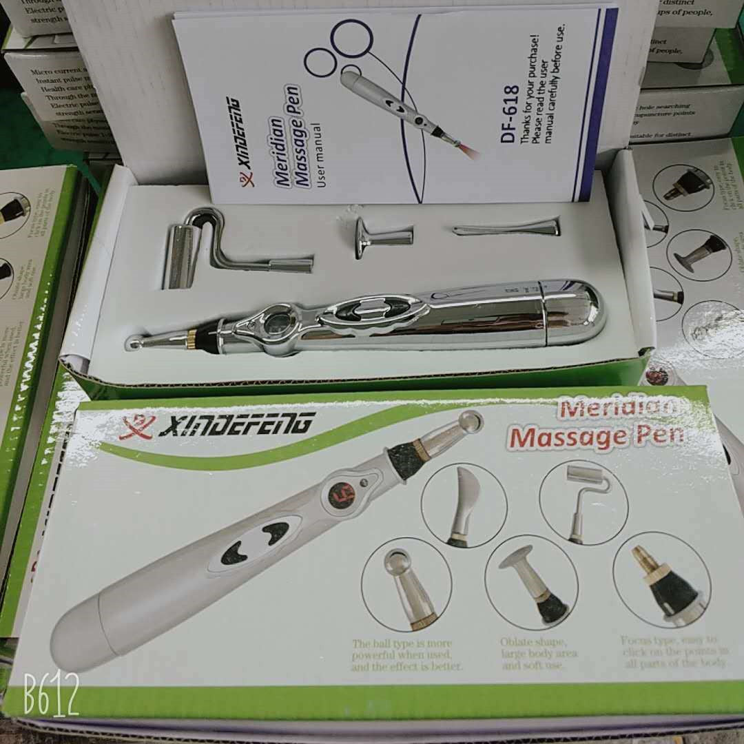 a group of boxes with a massage pen