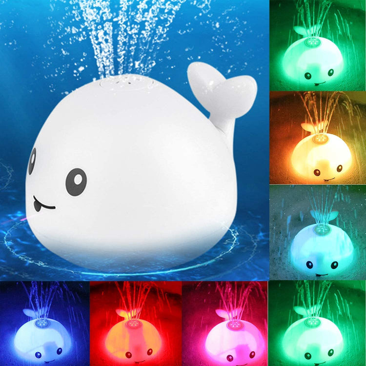 a whale shaped toy with different colored lights