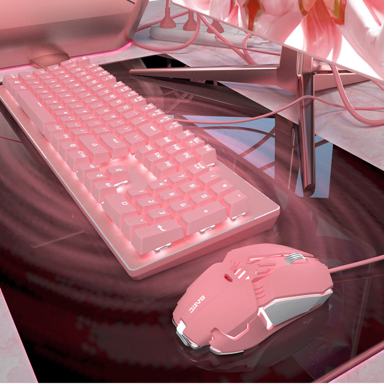 a pink keyboard and mouse on a table