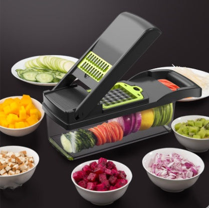 a vegetable cutter with bowls of food
