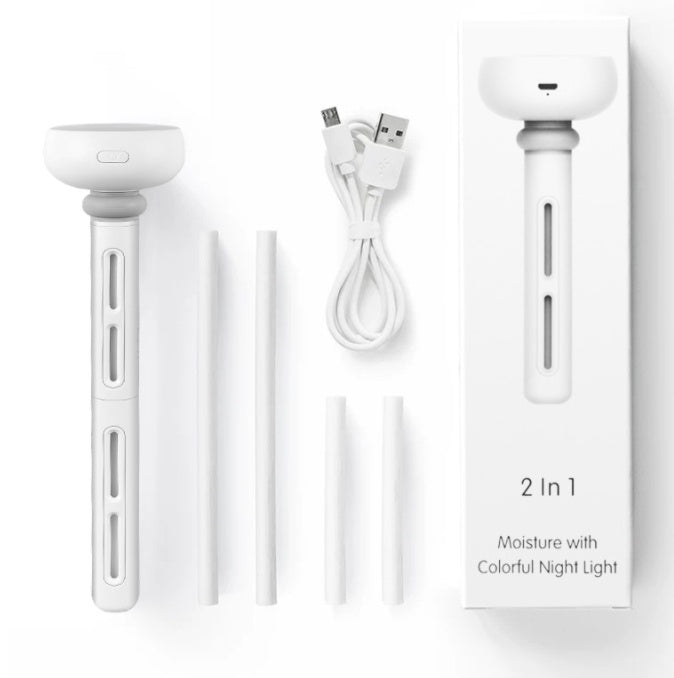 a white device with a box and wires