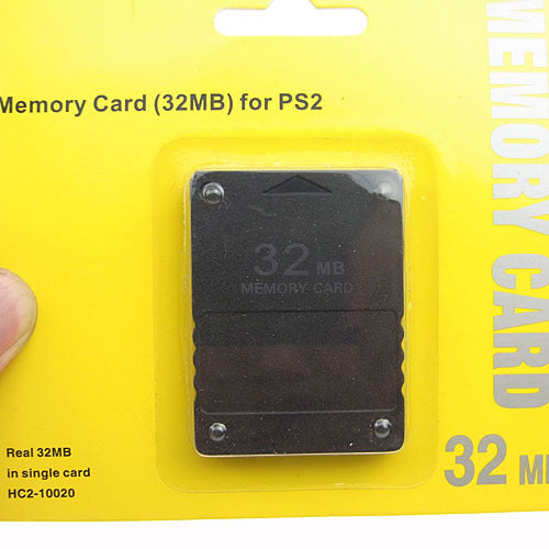 a hand holding a memory card