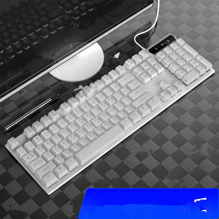 a keyboard and monitor on a table