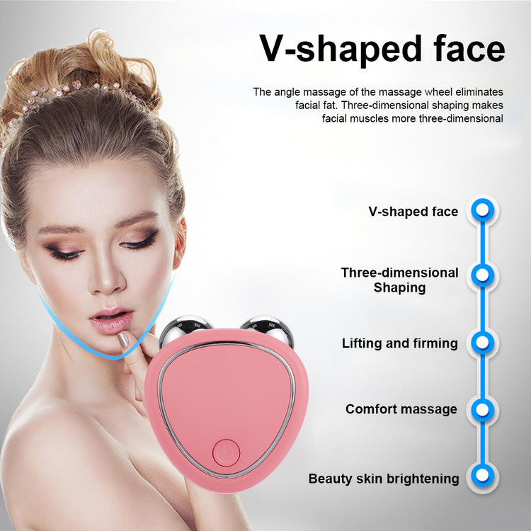 a woman using a device to massage her face