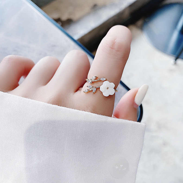 a hand with a ring on it
