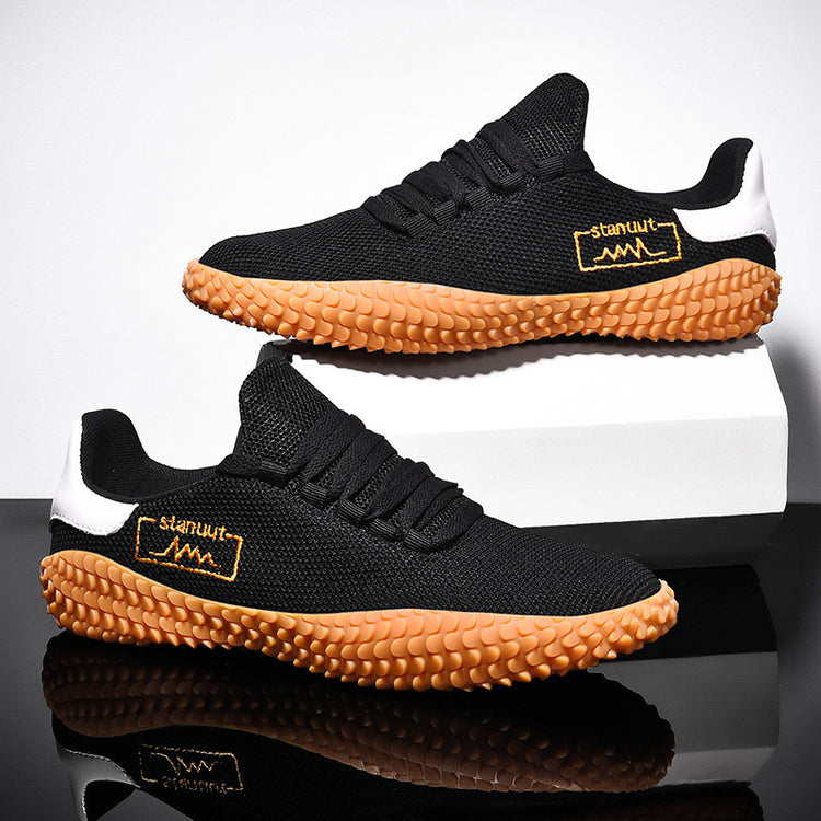 a pair of black and orange shoes
