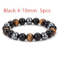 a bracelet with black and brown beads