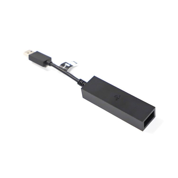 a black rectangular object with a cord