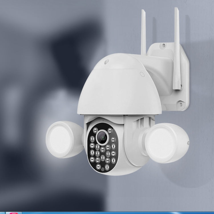 a white camera on a wall