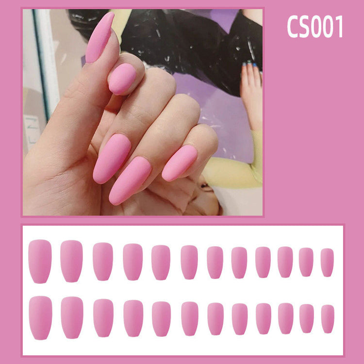 a hand with pink nails