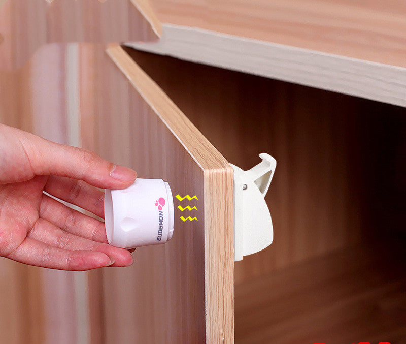 a hand holding a white object