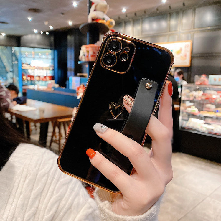 a hand holding a phone