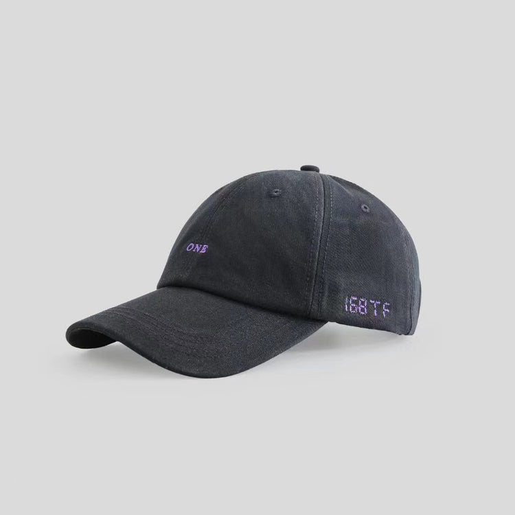 a black hat with purple text