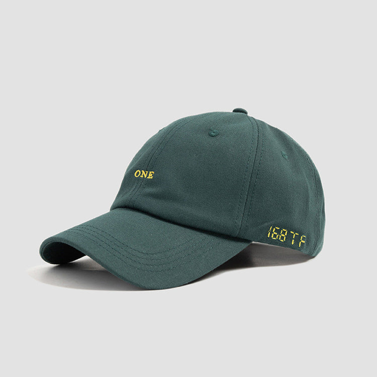 a green hat with yellow text