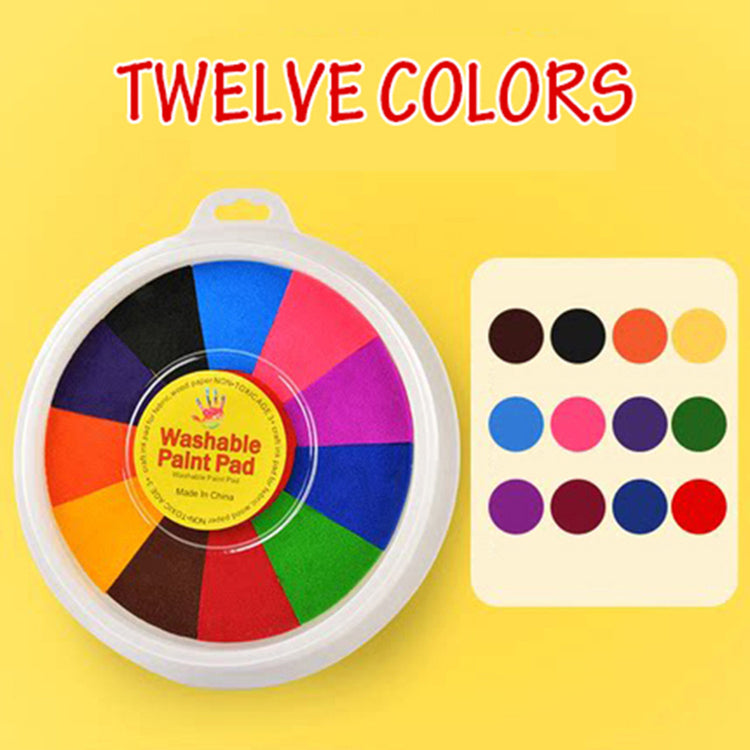a circular container with a colorful paint pad next to a card