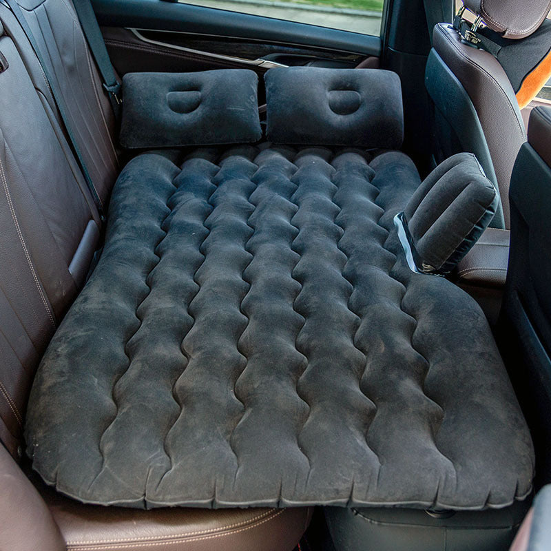 a mattress in the back of a car
