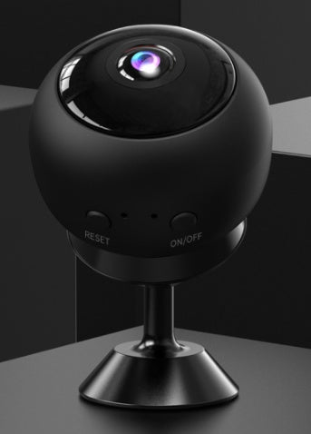 a black round object with a purple light