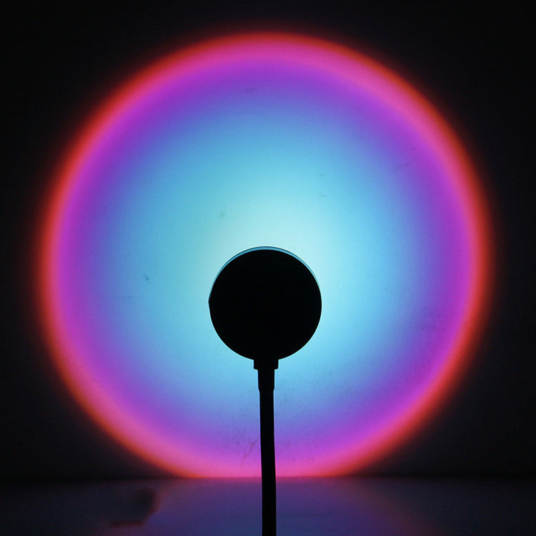 a round object with a colorful circle in the background
