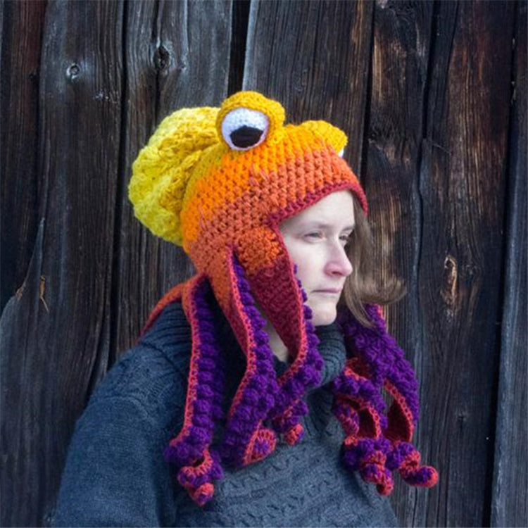 a woman wearing a knitted octopus hat