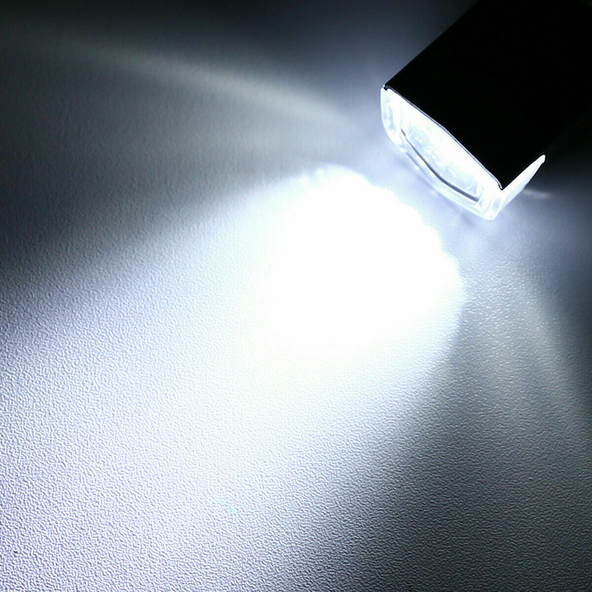 a light shining on a surface