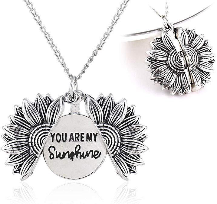 a necklace with sunflowers and words