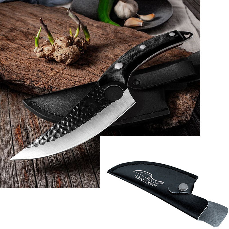 a knife on a wooden surface