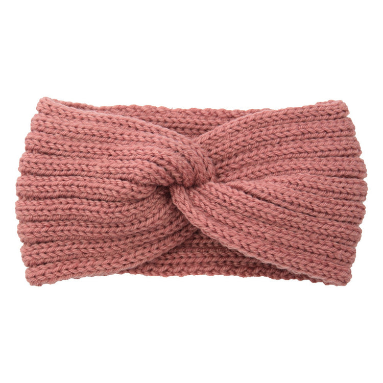 a pink knit headband with a knot
