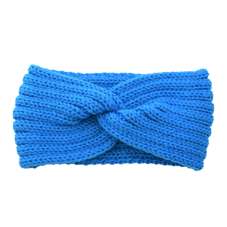 a blue knit headband with a knot