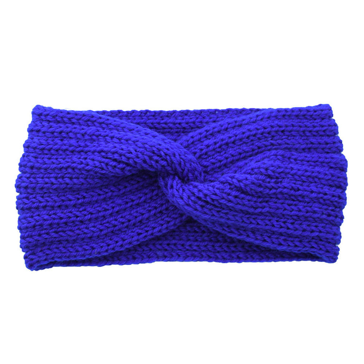 a blue knit headband with a knot