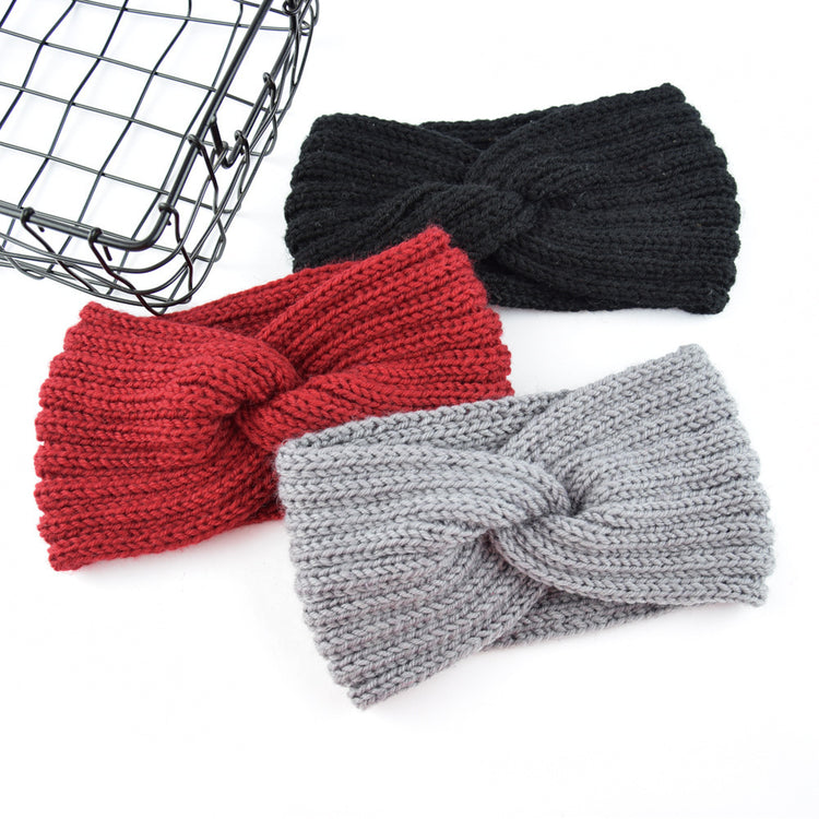 a group of knitted headbands