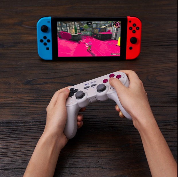 a person holding a video game controller