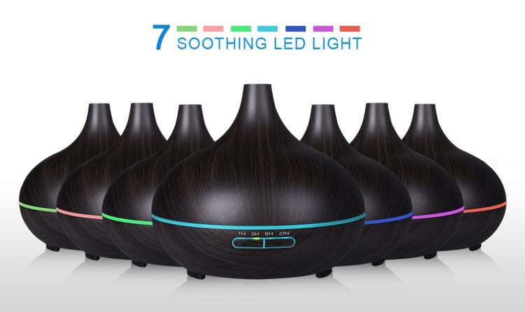 a group of black and green essential oil diffusers