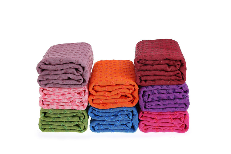 a stack of colorful blankets