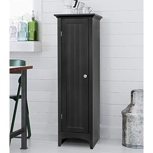 a tall cabinet with a silver pitcher on top