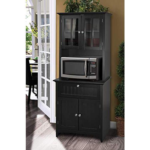 a microwave on a cabinet